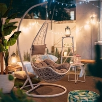 Poltrona sospesa rattan intrecciato con cuscini